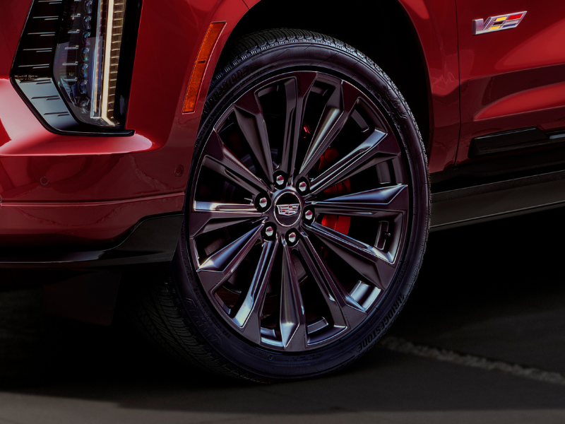 The 24-inch Wheels on a Red 2025 Cadillac Escalade