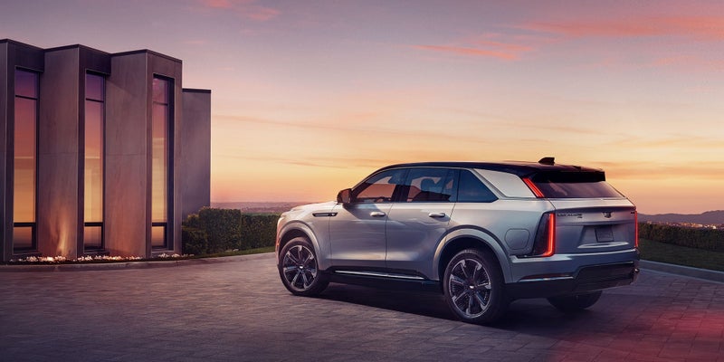 Cadillac Escalade in a driveway from Seaside Cadillac in SEASIDE CA